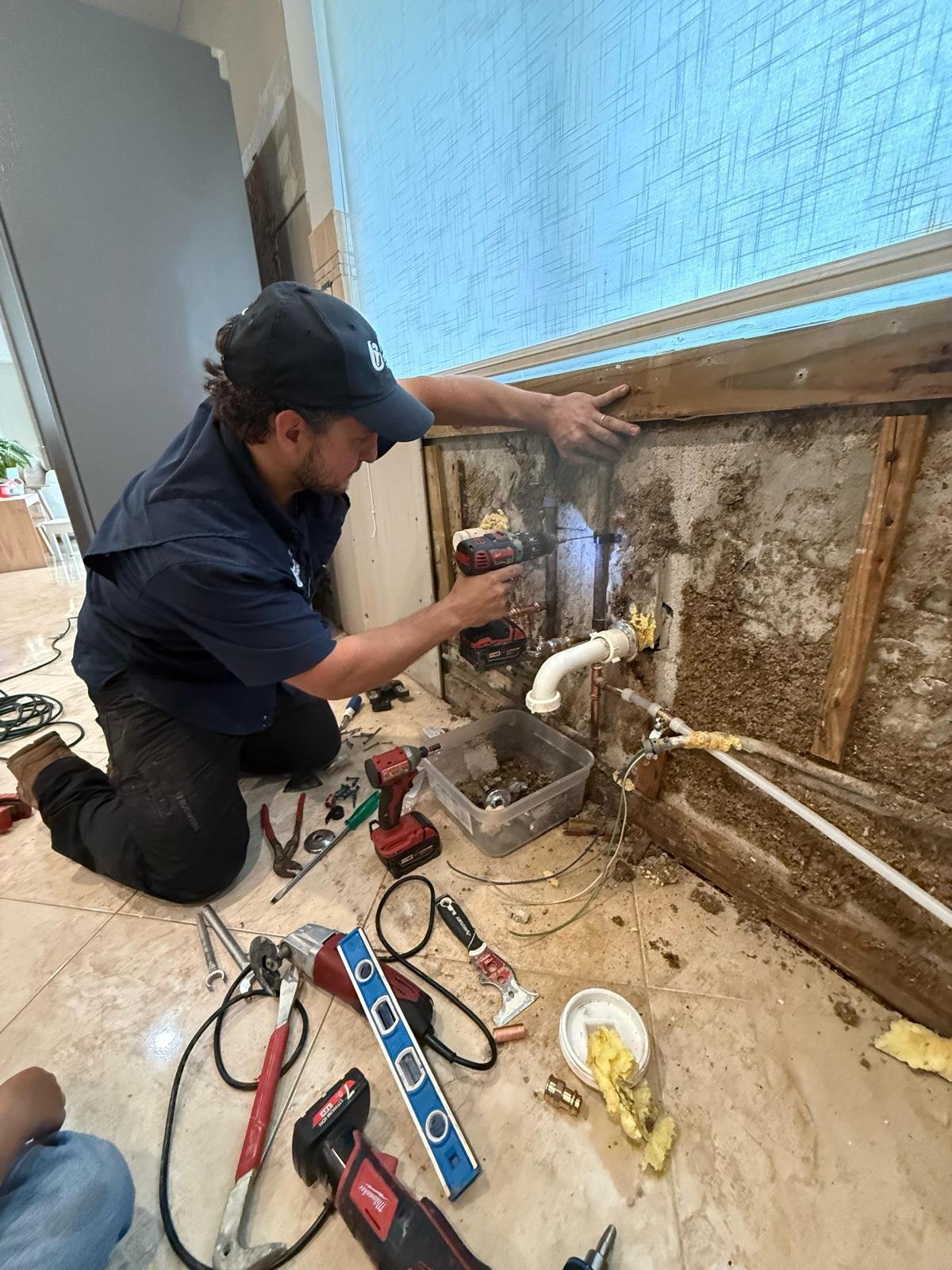 Licensed A&L Premier Plumbing technician locating a hidden water leak in Miramar, FL